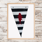 Nautical black and white striped pennant with a red fish silhouette and metal grommets for a picture frame.